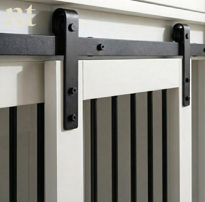 Black metal bracket on a white wooden surface
