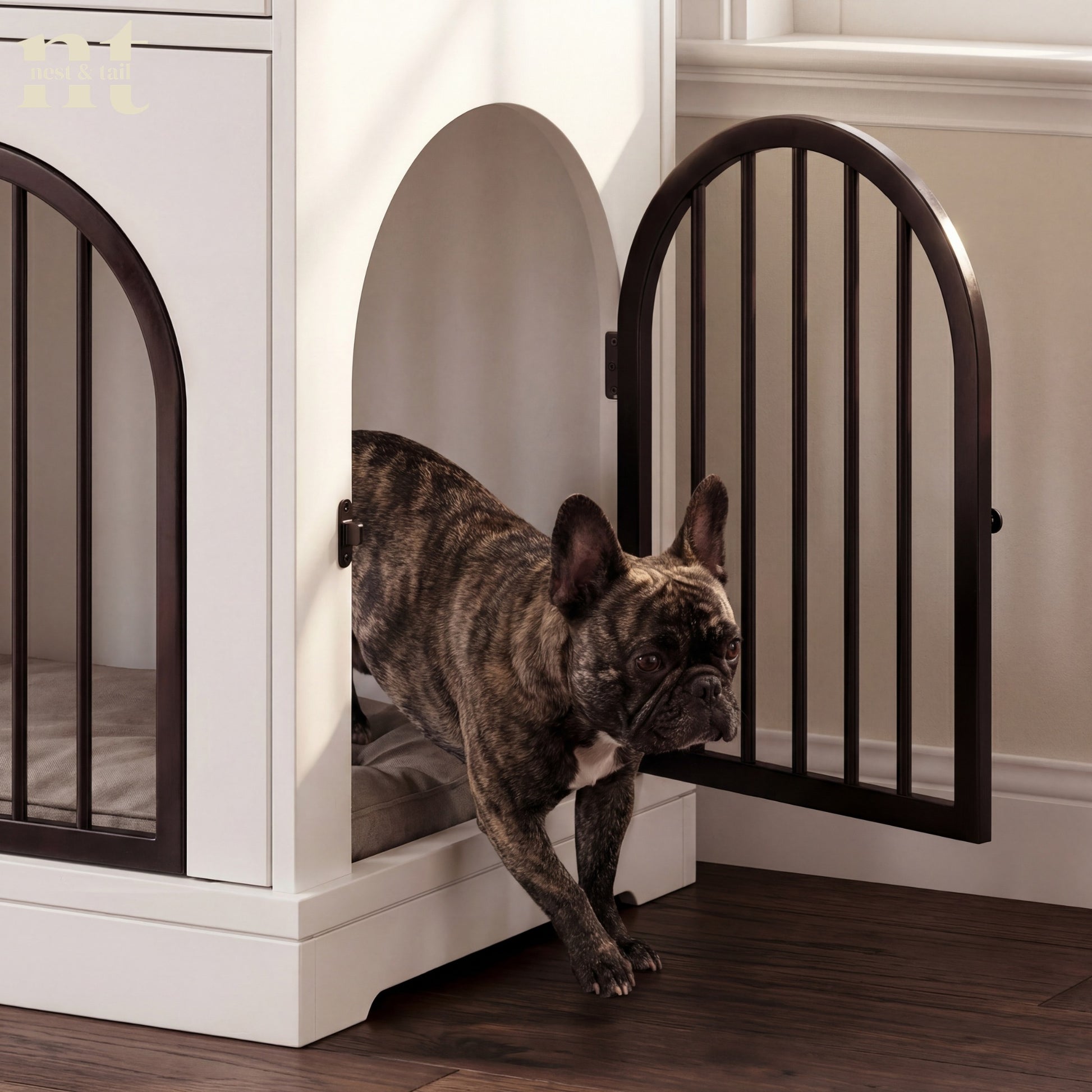 Dog entering a white pet crate with black metal doors.