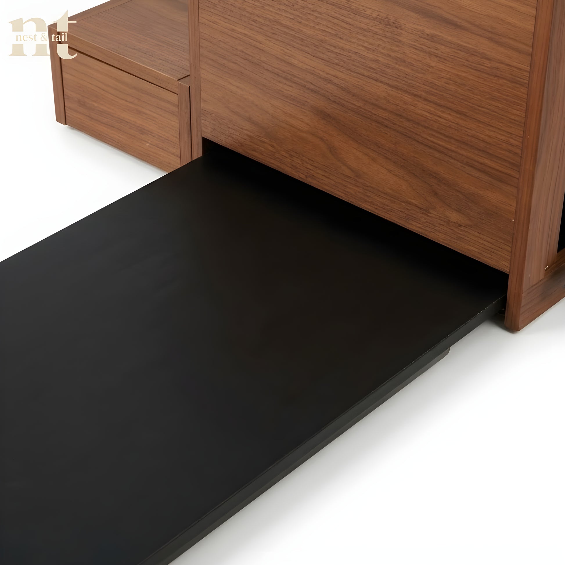 Wooden cabinet with a black tray on a white background